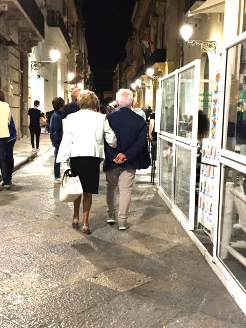 Older Sicilian couple in Trapani, Sicily photo by Margie Miklas